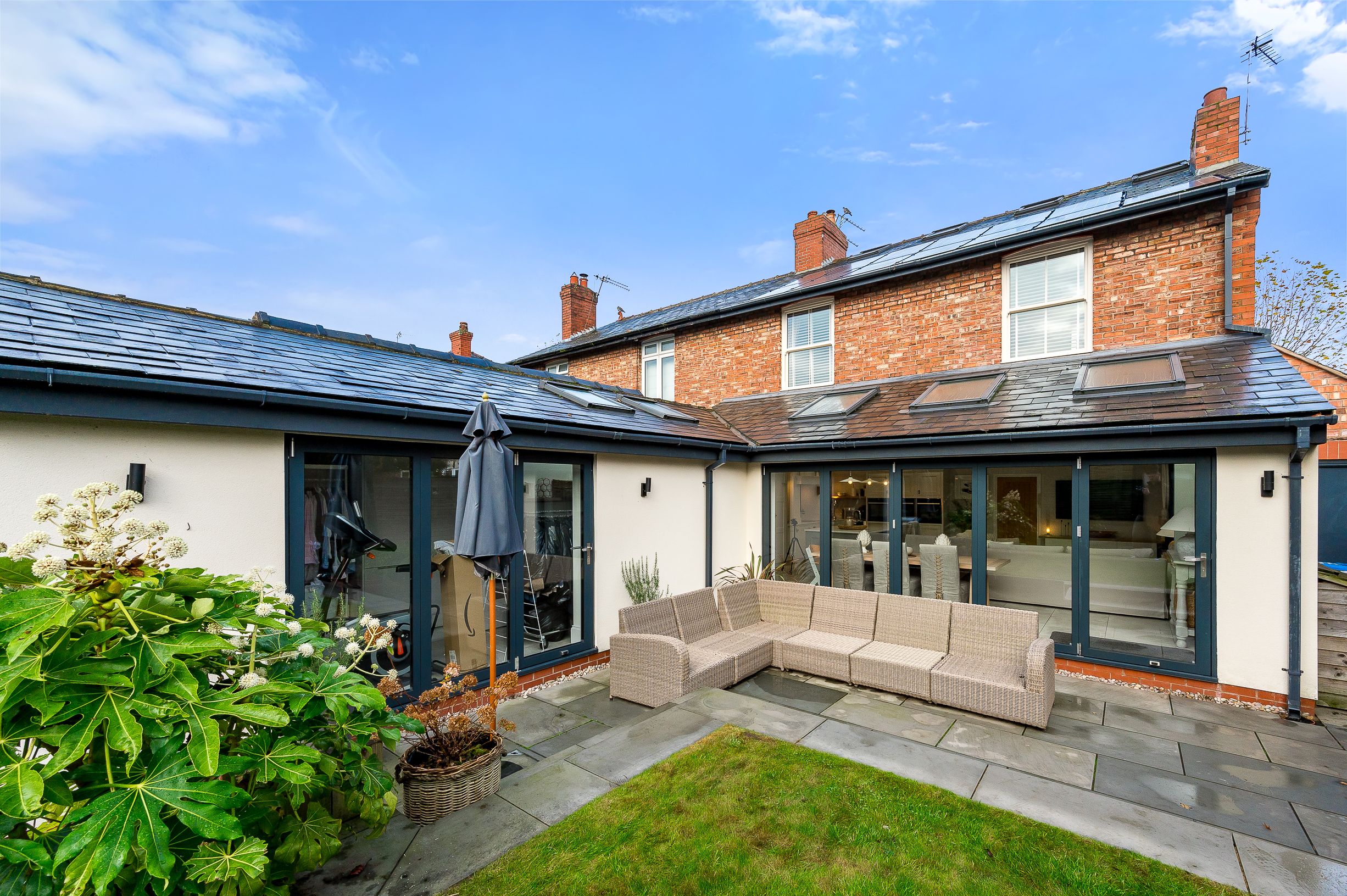 The back garden of a retrofitted home that now helps save money and produces low energy