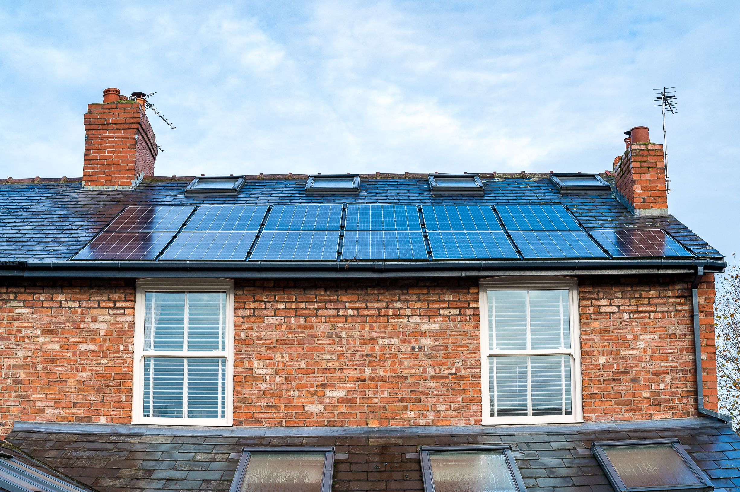 solar panels on top of a retrofitted home